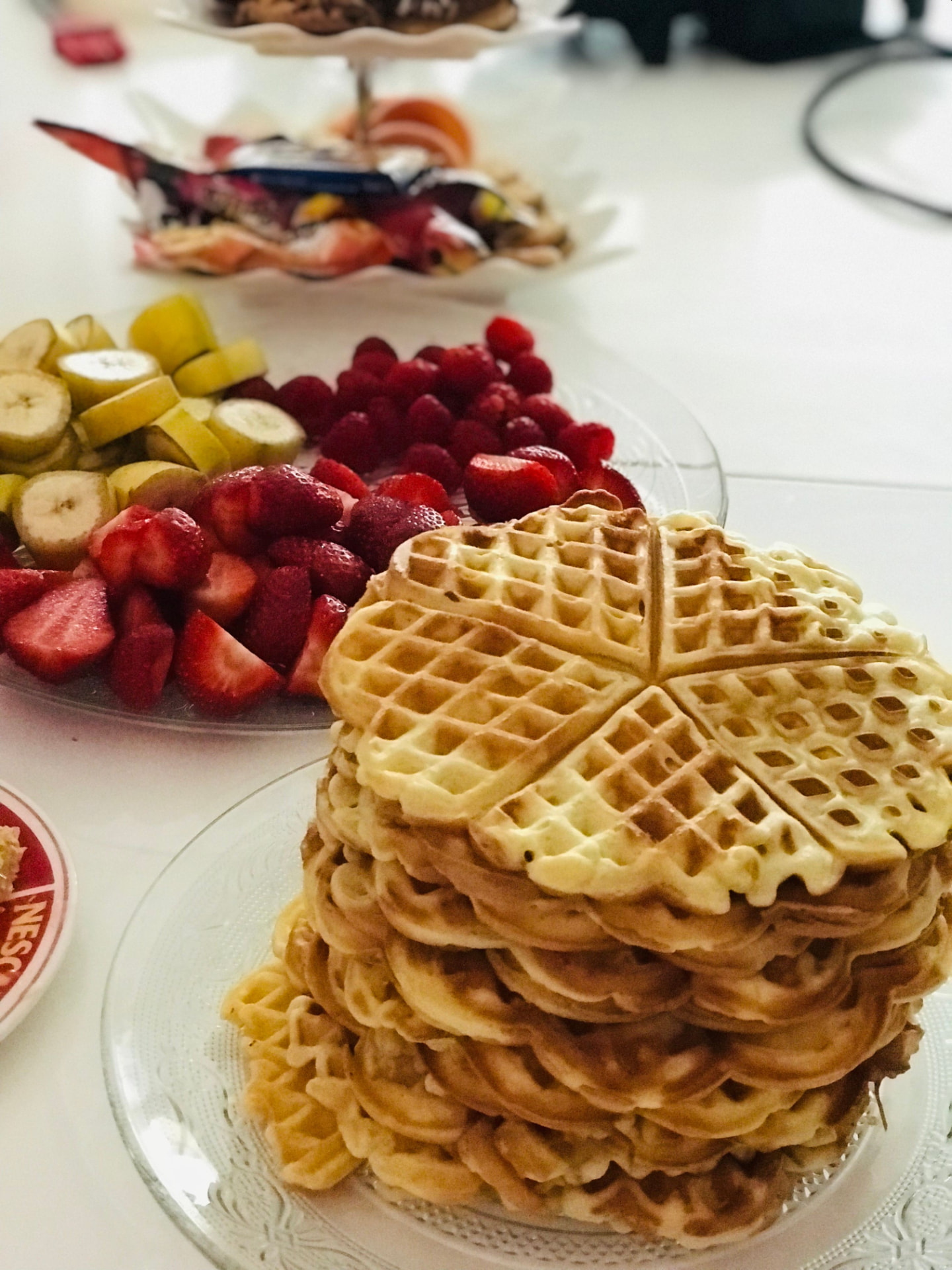 Norwegian heart-shaped waffles served with jam and berries